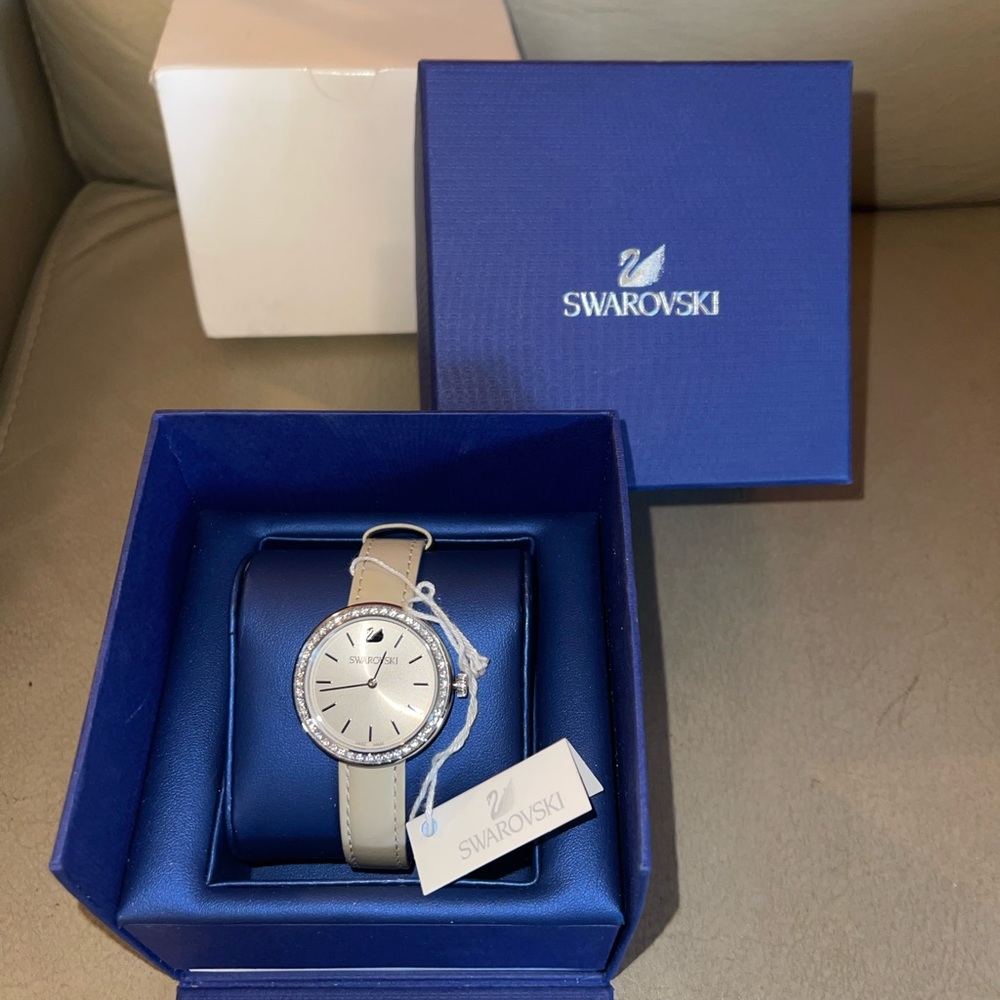Authentic Swarovski crystal Daytime watch inlined w/crystals in the bezel MOP